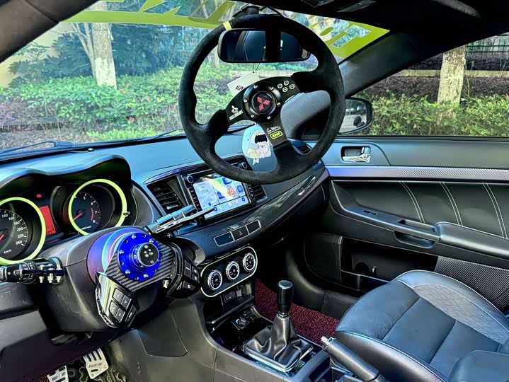 Mitsubishi Lancer EX — фото 19