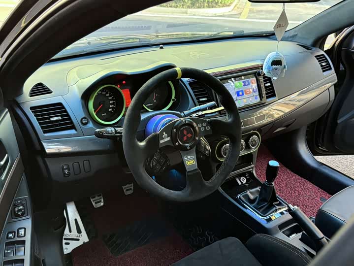 Mitsubishi Lancer EX — фото 12