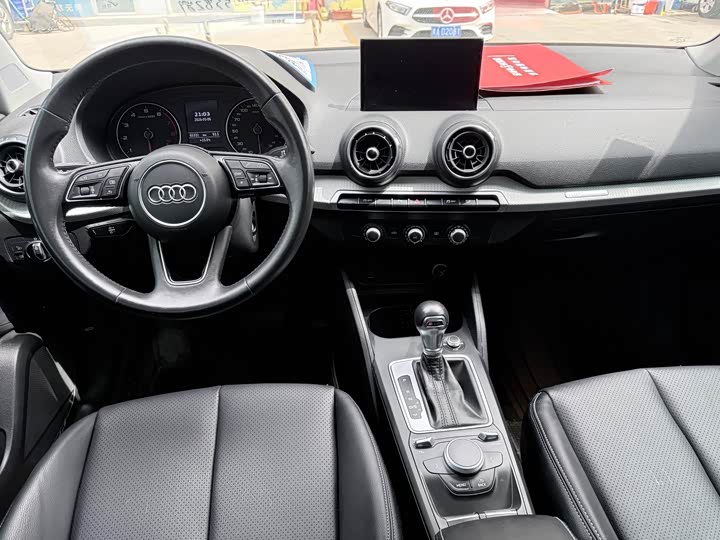 Audi Q2L 2021 35 TFSI — фото 11